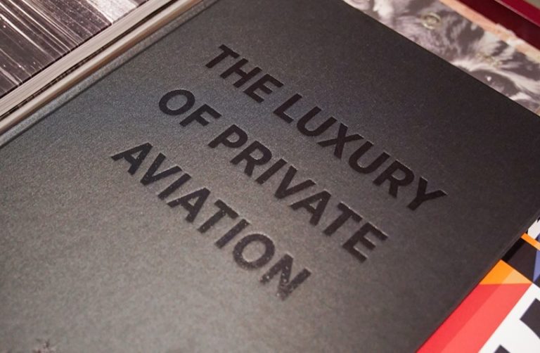 Book on table private aviation