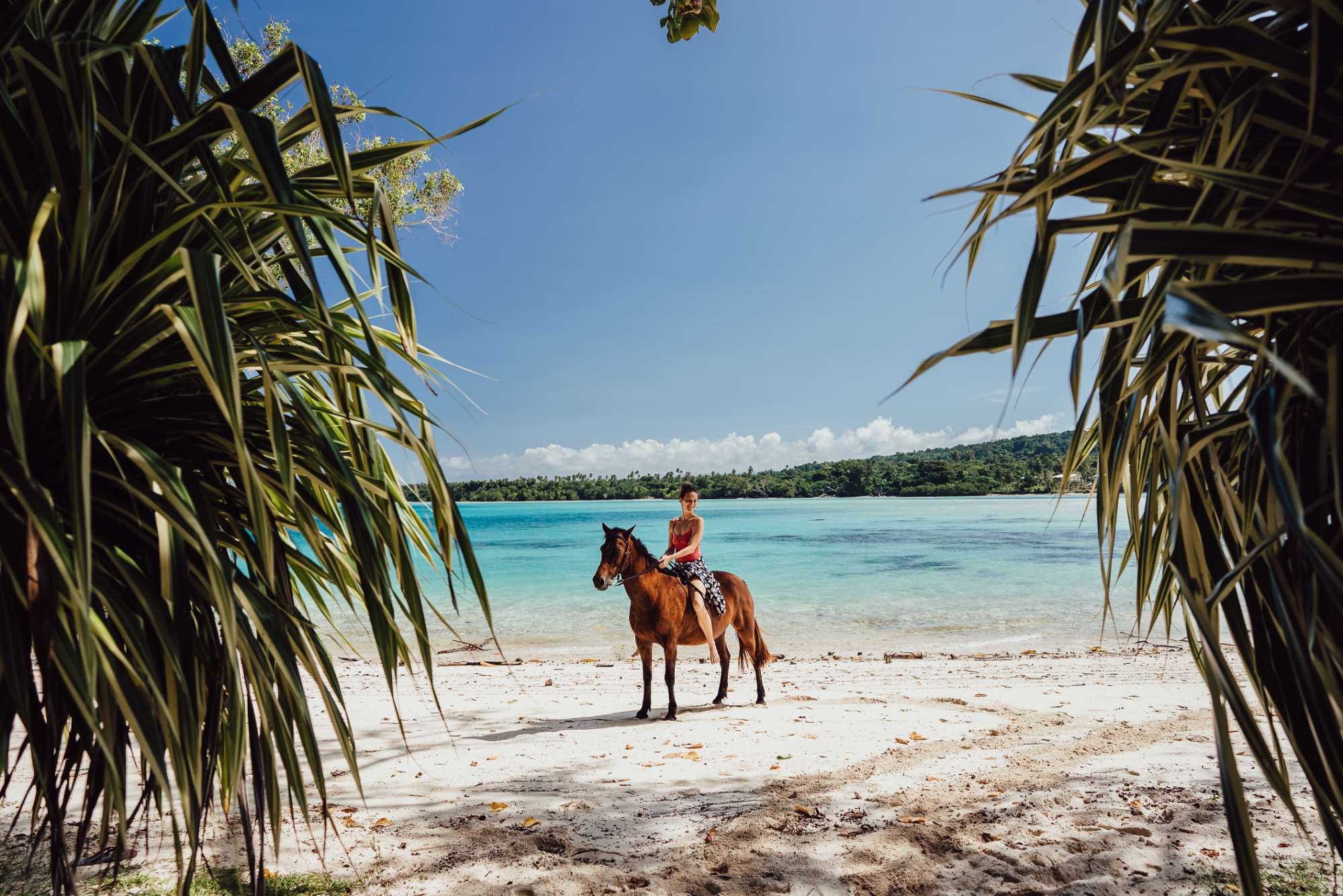 Horse riding on the beach at Ratua Private Island