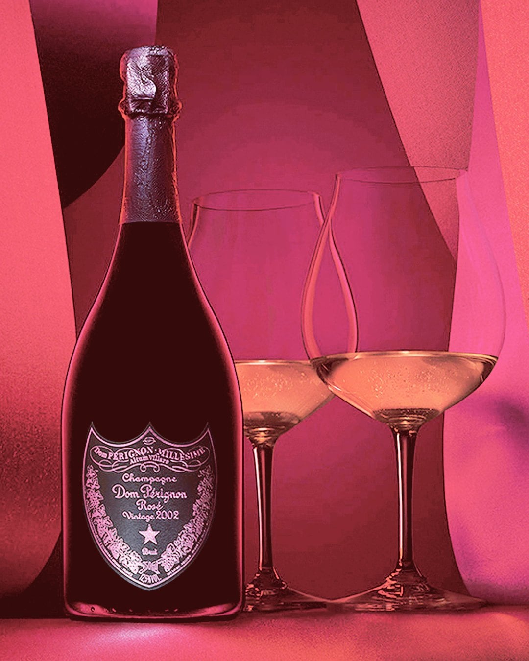 A bottle of vintage rosé Champagne beside two filled glasses